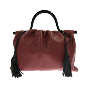 Loewe nappa leather anagram drawstring fringe handbag Red